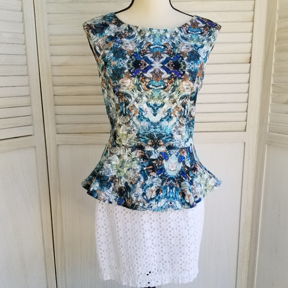 Suite Blanco Tops - Suite Blanco Woman’s sleeveless peplum top. Large